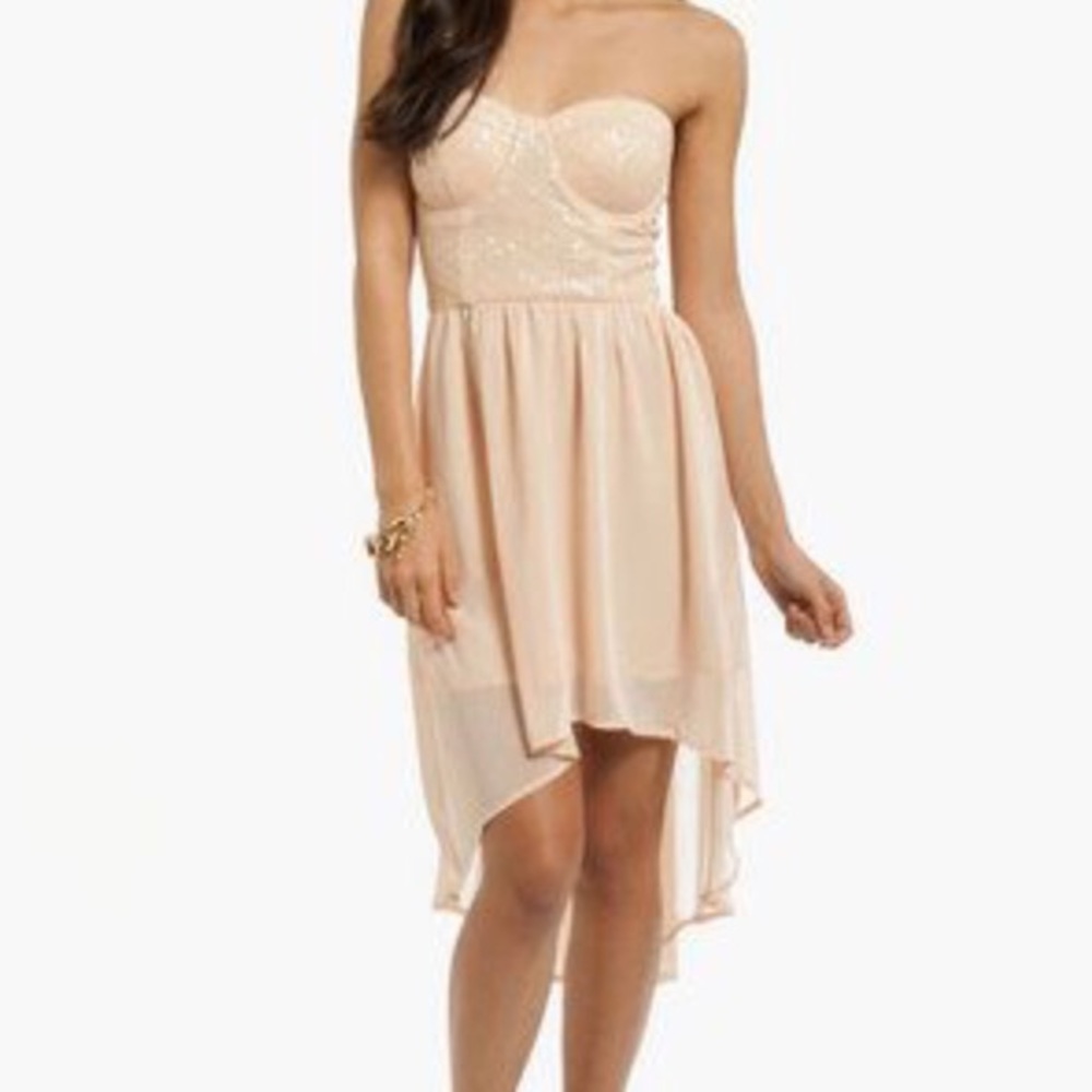 Lush high low formal dress with sequins.